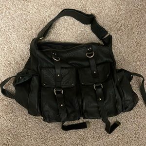 Leather bag with multiple pockets, utilitarian boho